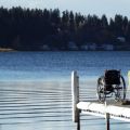 Lois Smith, wheelchair on dock at Dragon Lake 2014 1.JPG